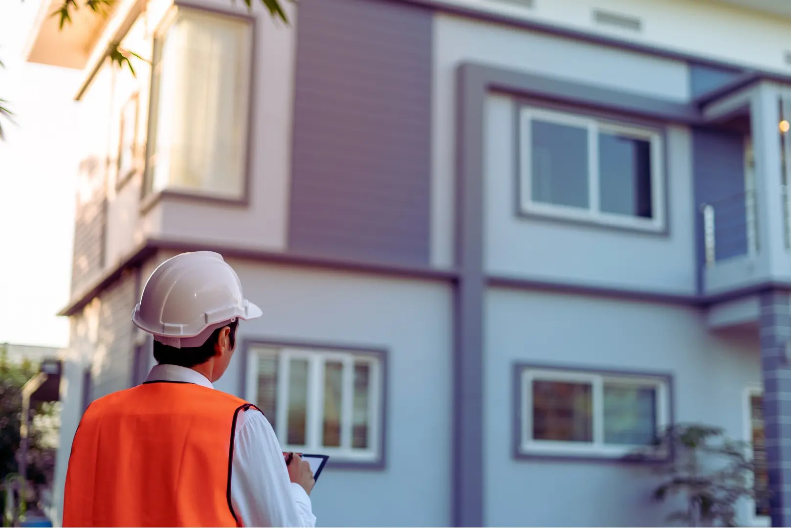 Inspecting the exterior of a Vancouver Island home